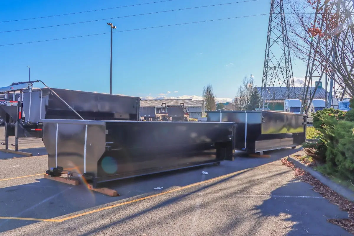 Roll-off dumpster ready for waste disposal at job site for 15 Yard Dumpster Rental in Centerville